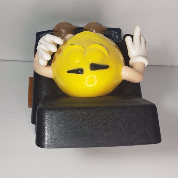 Yellow M&M on Black La-Z-Boy Dispenser - Picture 6 of 9